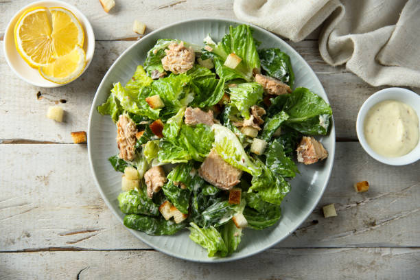 Salmon salad Homemade salad with croutons and salmon caesar salad food salad tuna stock pictures, royalty-free photos & images