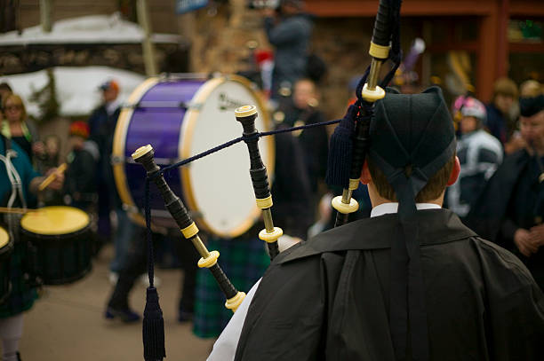 Group of drum players and a bagpipe group in the Labor day parade in September 12th, 2015, Manhattan, New York City, USA