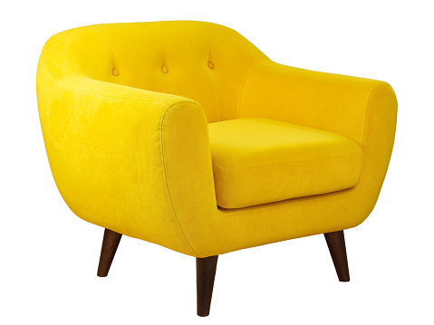 wide yellow upholstered armchair with fabric upholstery on wooden legs in retro style, isolated on a white background