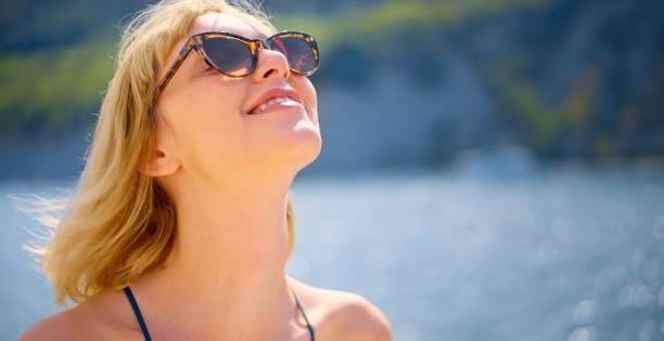 istock Woman basking in sun 1398793091