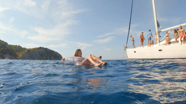 istock Friends relaxing on floats 1398793543