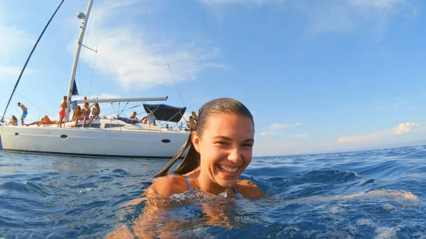 istock Woman swimming in sea 1398793593
