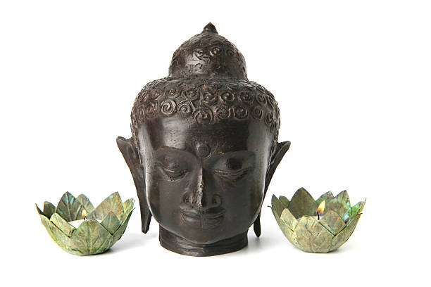 istock Buddha head with lotus candle holders 139879468