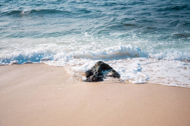 istock sand of beach and soft wave background 1398796601