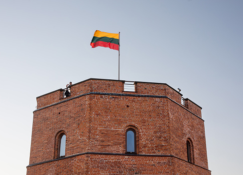 Vilnius, Lithuania - March 19, 2022: Gediminas Tower on the hill in the old town center in Vilnius, Lithuania. The tower is an important state and historic symbol of the city of Vilnius.