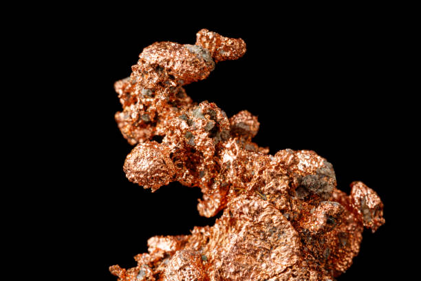 istock Macro mineral stone Copper on black background 1398799108