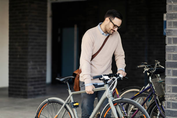 istock An environmentally conscious man taking bicycle to ride. 1398800066
