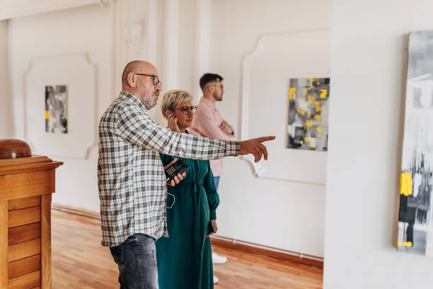 istock Couple in art gallery 1398800740