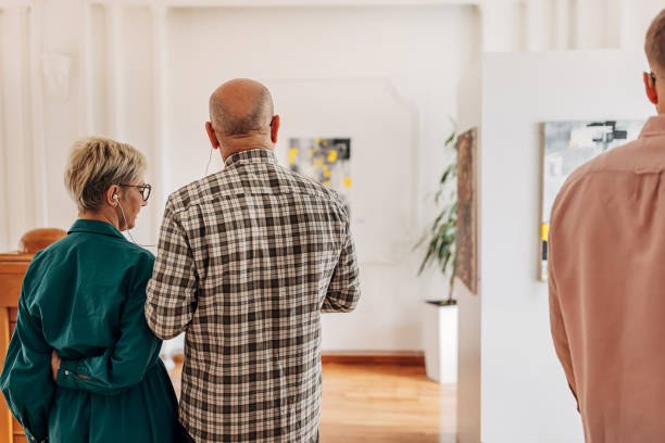 istock Couple in art gallery 1398800836