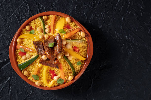istock Couscous with meat and vegetables, festive Moroccan dinner, overhead 1398801387