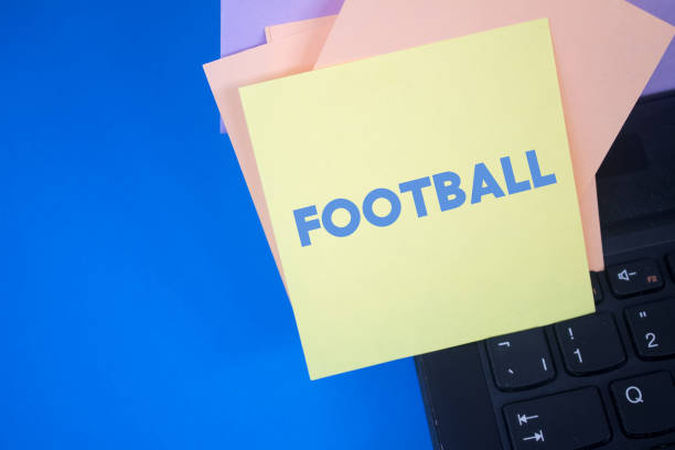 istock Football. Text on adhesive note paper. 1398802358