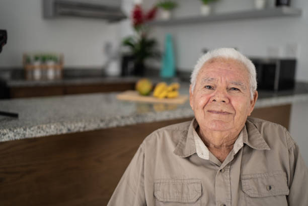 istock Portrait of senior man at home 1398802497