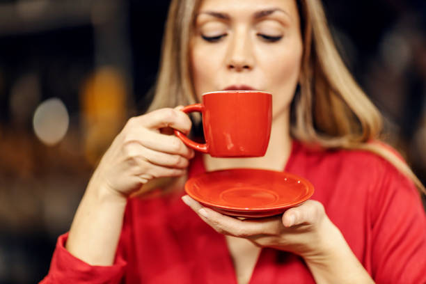 istock A woman drinking fresh cup of coffee. 1398802578