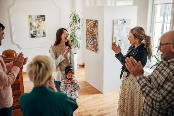 istock Female artist at gallery opening 1398802613