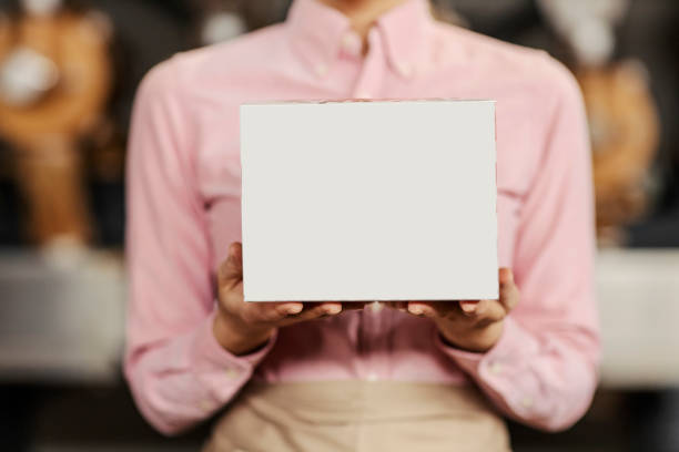 istock Barista's hands holding a box. 1398802892