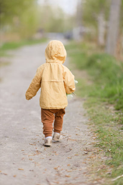 istock A child runs down the street 1398803585