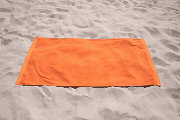 300+ Orange Beach Towel Stock Photos, Pictures & Royalty-Free Images ...