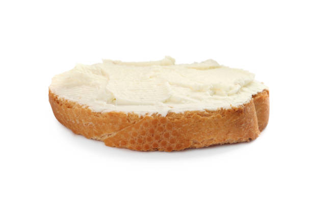 istock Delicious sandwich with cream cheese isolated on white 1398804435