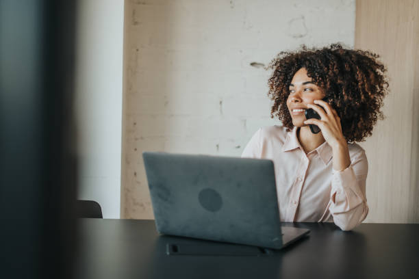 istock Businesswoman working at her desk 1398805068