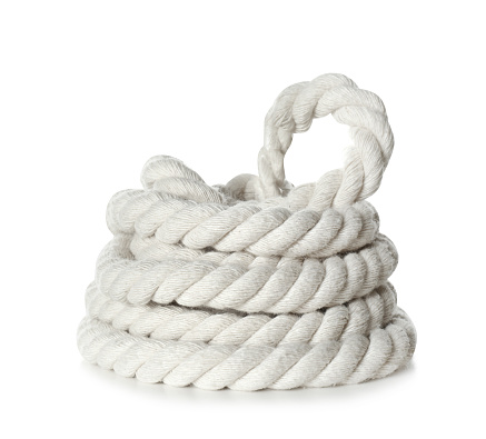 Bundle of cotton rope on white background. Organic material