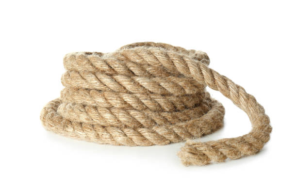 istock Bundle of hemp rope on white background. Organic material 1398805176