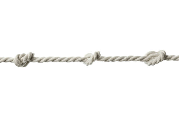istock Cotton rope with knots on white background 1398805198