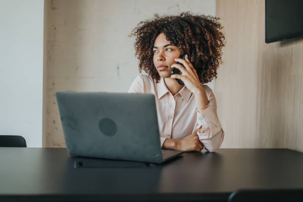 istock Businesswoman working at her desk 1398805270