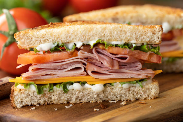 istock Ham sandwich with cheese, lettuce and tomato 1398806487