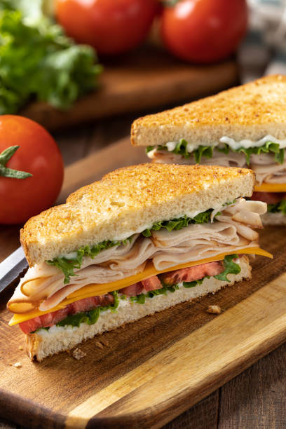 istock Turkey sandwich on toasted bread cut in half 1398806488