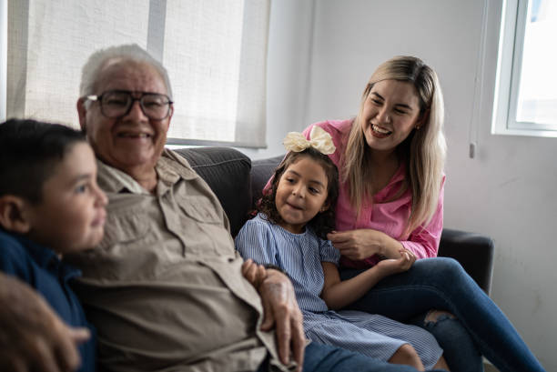 istock Family enjoying themselves and talking at home 1398807164