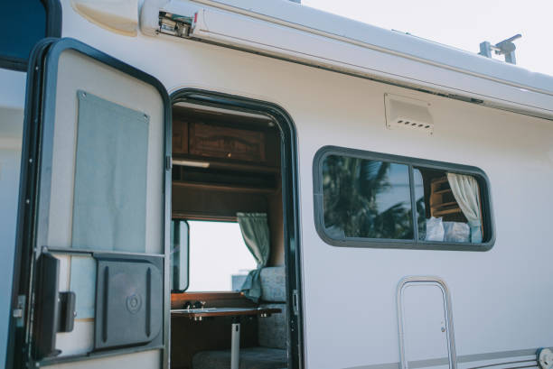 istock looking through door inside of motorhome with table and sofa backseat beside window 1398807346