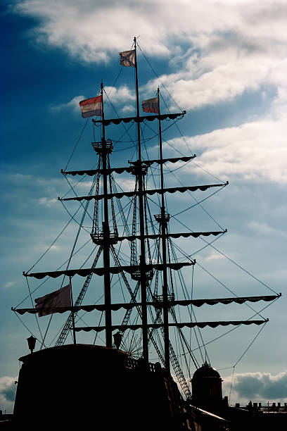 Jury-masts and rope of sailing ship stock photo