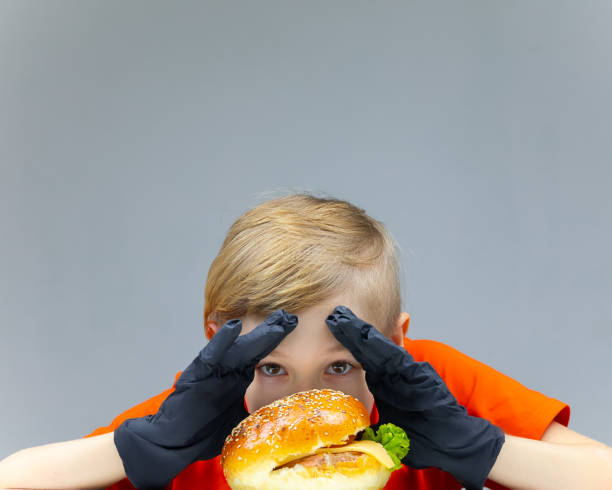 istock the boy with the cheeseburgers 1398808684