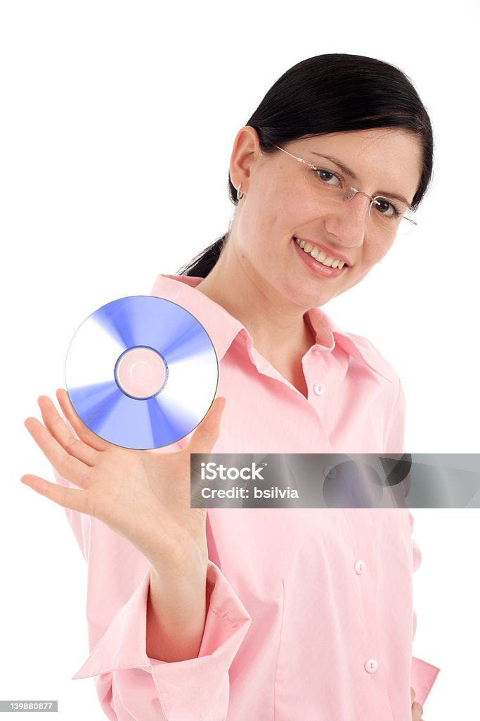 Молодая женщина держит CD - Стоковые фото CD-ROM роялти-фри