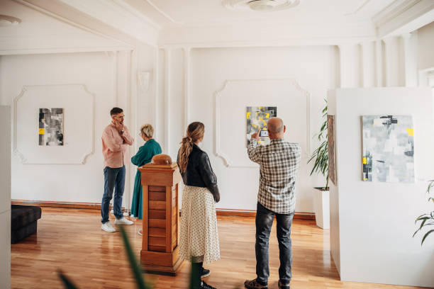 istock People in art gallery 1398810232