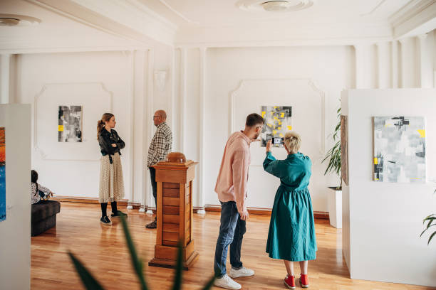 istock People in art gallery 1398810371