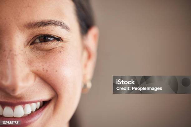 Face Of Beautiful Mixed Race Woman Smiling With White Teeth Portrait Of A Womans Face With Brown Eyes And Freckles Posing With Copyspace Dental Health And Oral Hygiene Stock Photo - Download Image Now