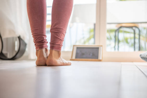 istock Woman getting fit in her apartment 1398812224