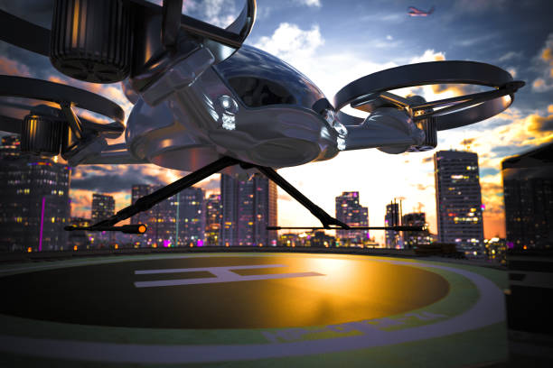 eVTOL ready to land on the roof tarmac These aircrafts use battery power to lake off, hover, and land, so their electric power has the chance to change how we think about green transportation in the future. They can be used to transport people and cargo.3D rending. helicopter modern stock pictures, royalty-free photos & images