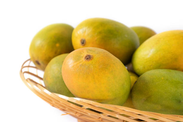 istock indian mangos in a basket on a white background in close up view 1398814194