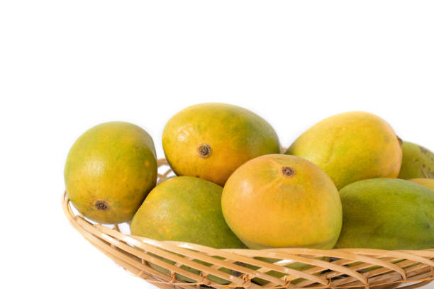 istock indian mangos in a basket on a white background in close up view 1398814200