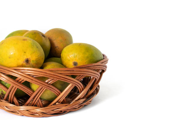 istock indian mangos in a basket on a white background 1398814531