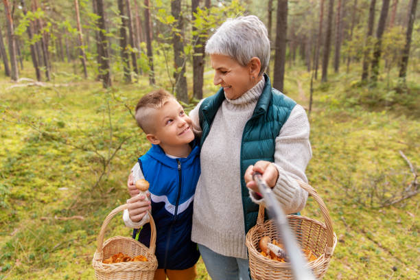 istock grandmother and grandson with baskets take selfie 1398814563