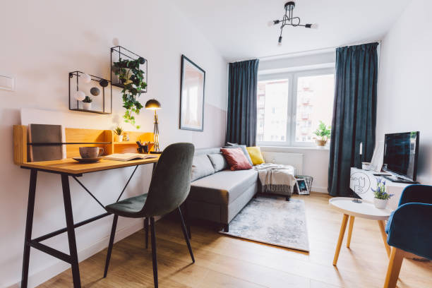 Interior of small apartment living room for home office. Interior of small apartment living room for home office. Real estate rent and home staging small living room interior stock pictures, royalty-free photos & images