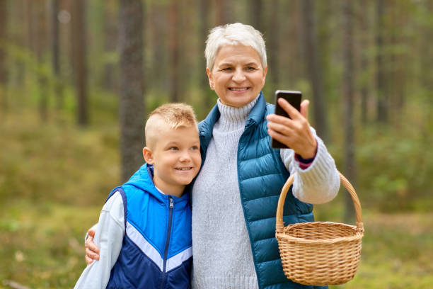 istock grandmother and grandson with baskets take selfie 1398815573