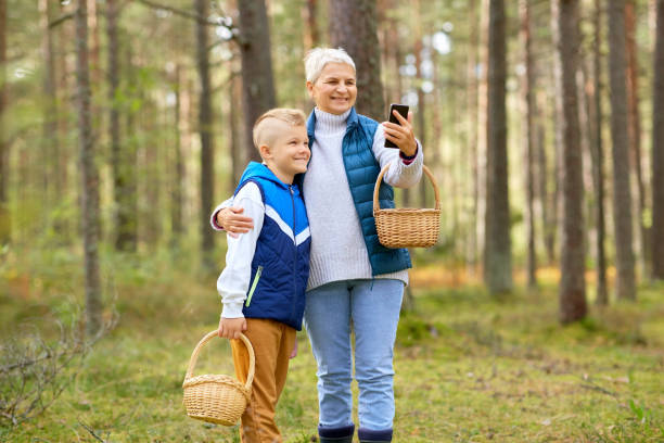 istock grandmother and grandson with baskets take selfie 1398816929