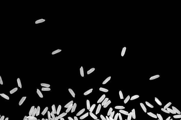 A pile of raw white rice is floating