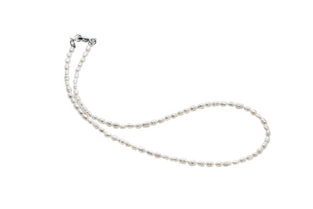 Pearl jewelry on a white background stock photo