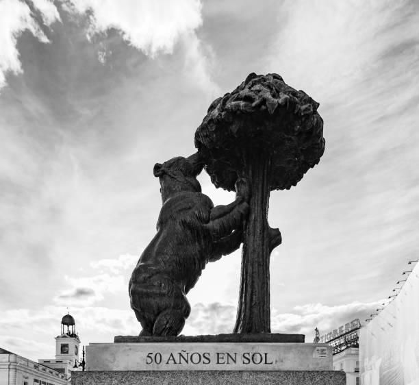 Madrid, Spain - April 24, 2022: A black and white picture of the Statue of the Bear and the Strawberry Tree statue.