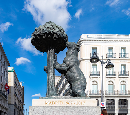 Madrid, Spain - April 24, 2022: A picture of the Statue of the Bear and the Strawberry Tree statue.